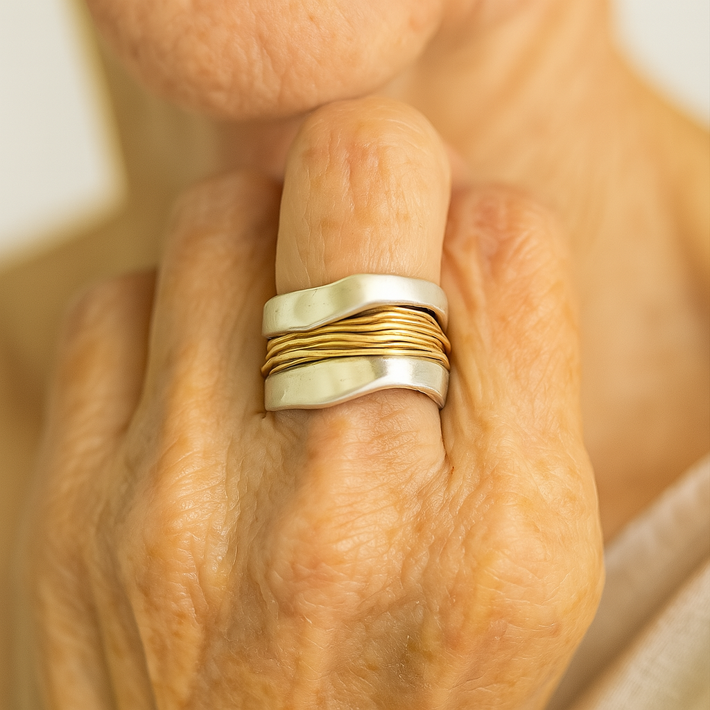 Silver ring with golden threads